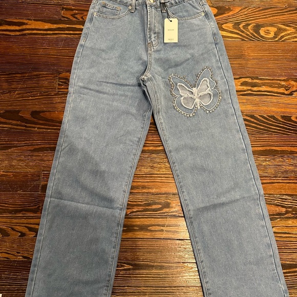 Women's Blue Jeans with Butterfly Design - Picture 1 of 4